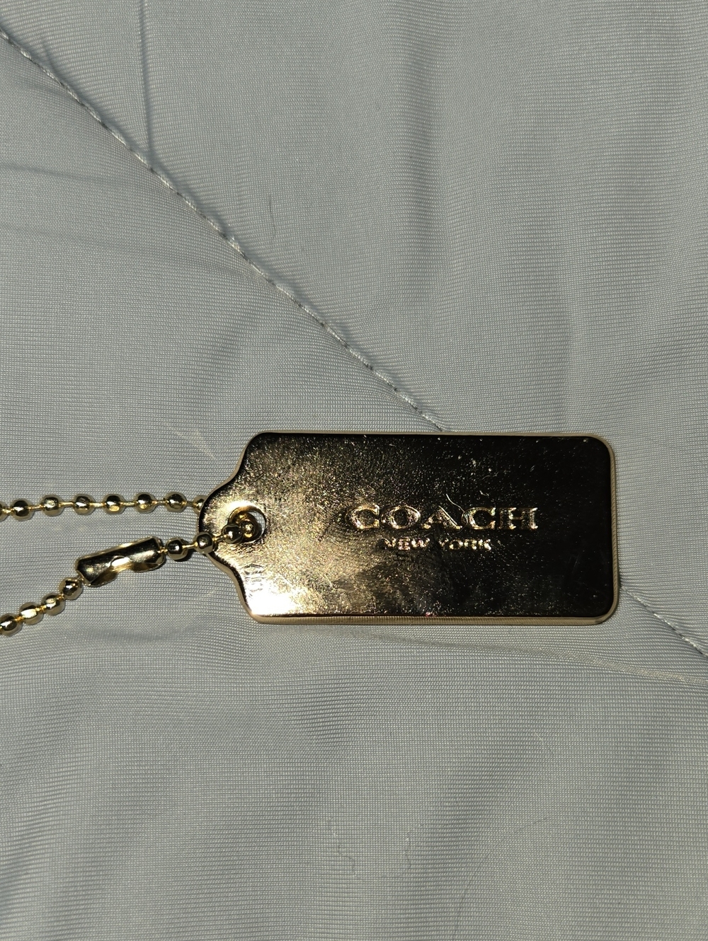 Coach Gold-Tone Hang Tag